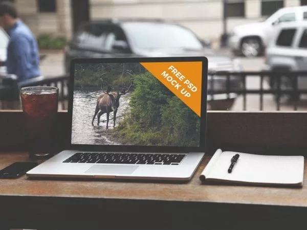 MacBook in a Street Сafe Mockup