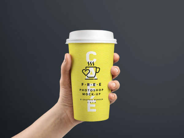 Free Medium and Small Cup In Hand MockUp PSD