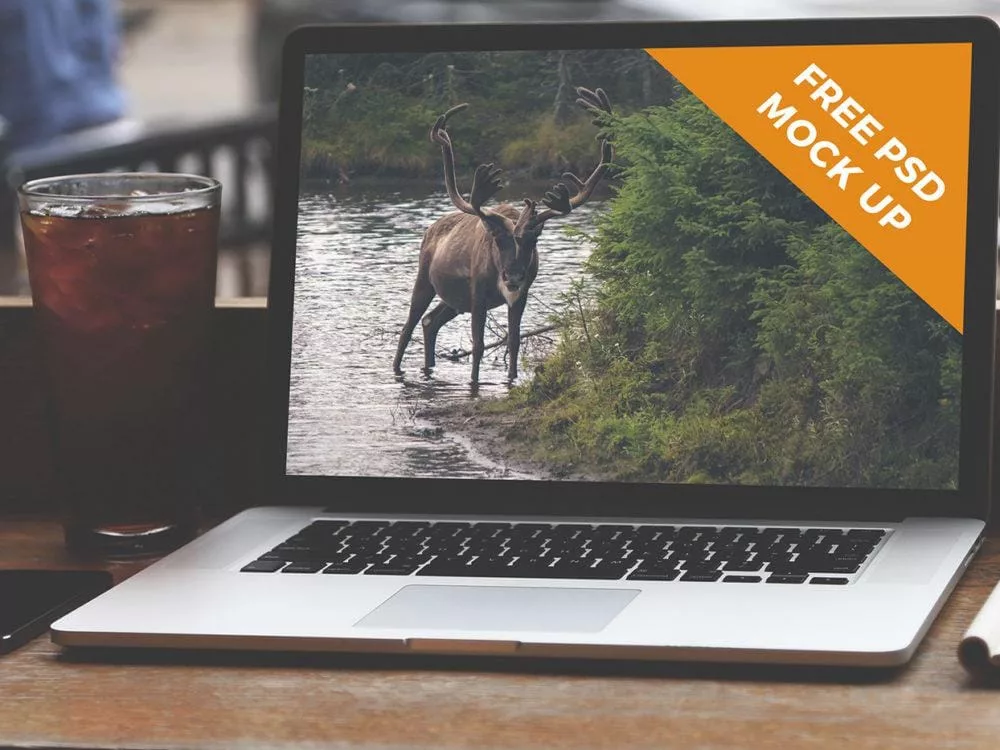 MacBook in a Street Сafe Mockup