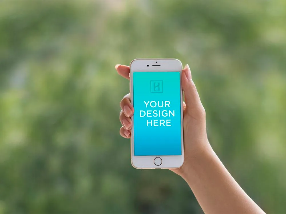 iPhone 6 in female Hand Mockup