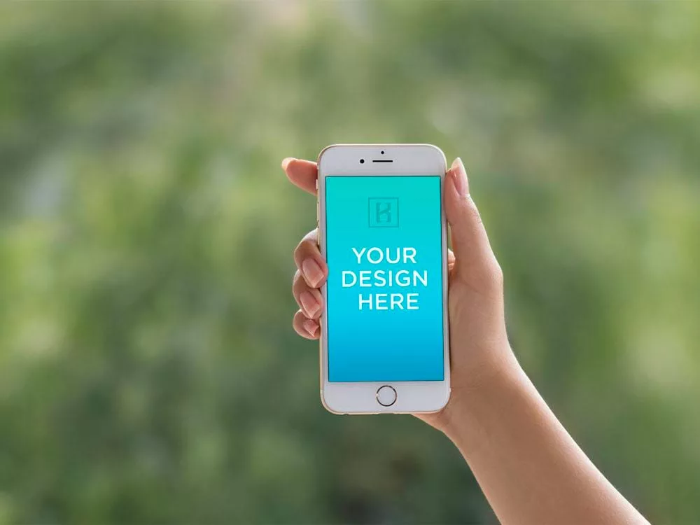 iPhone 6 in female Hand Mockup