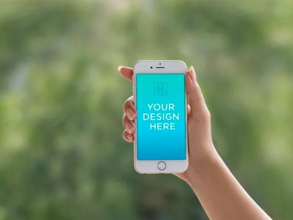 iPhone 6 in female Hand Mockup