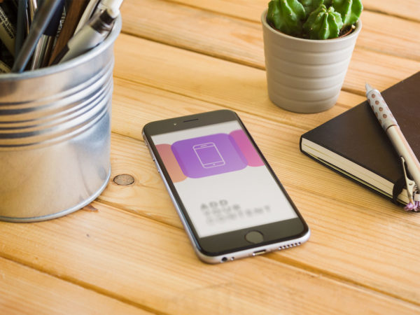 iPhone 6 on Wooden Table Free PSD Mockup