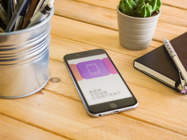 iPhone 6 plus on Wooden Table – Free PSD Mockup