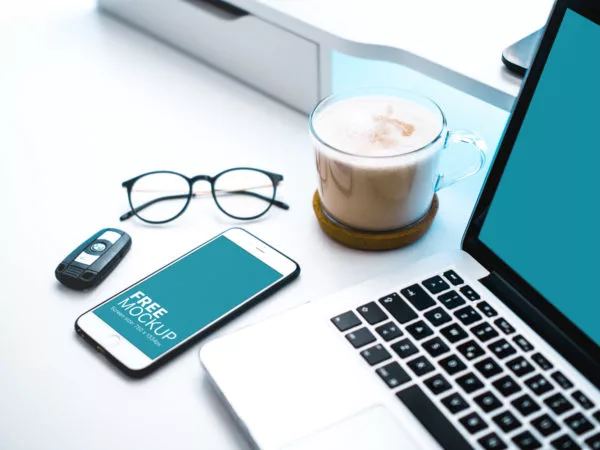 White iPhone Beside a Cappuccino and Car Keys Free Mockup