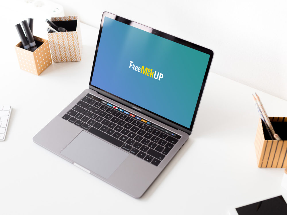 Macbook pro with touch bar mockup | free mockup