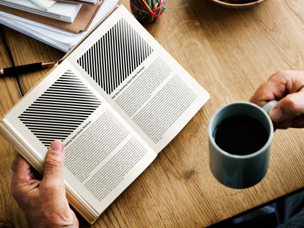 Man Reading Open Book Mockup