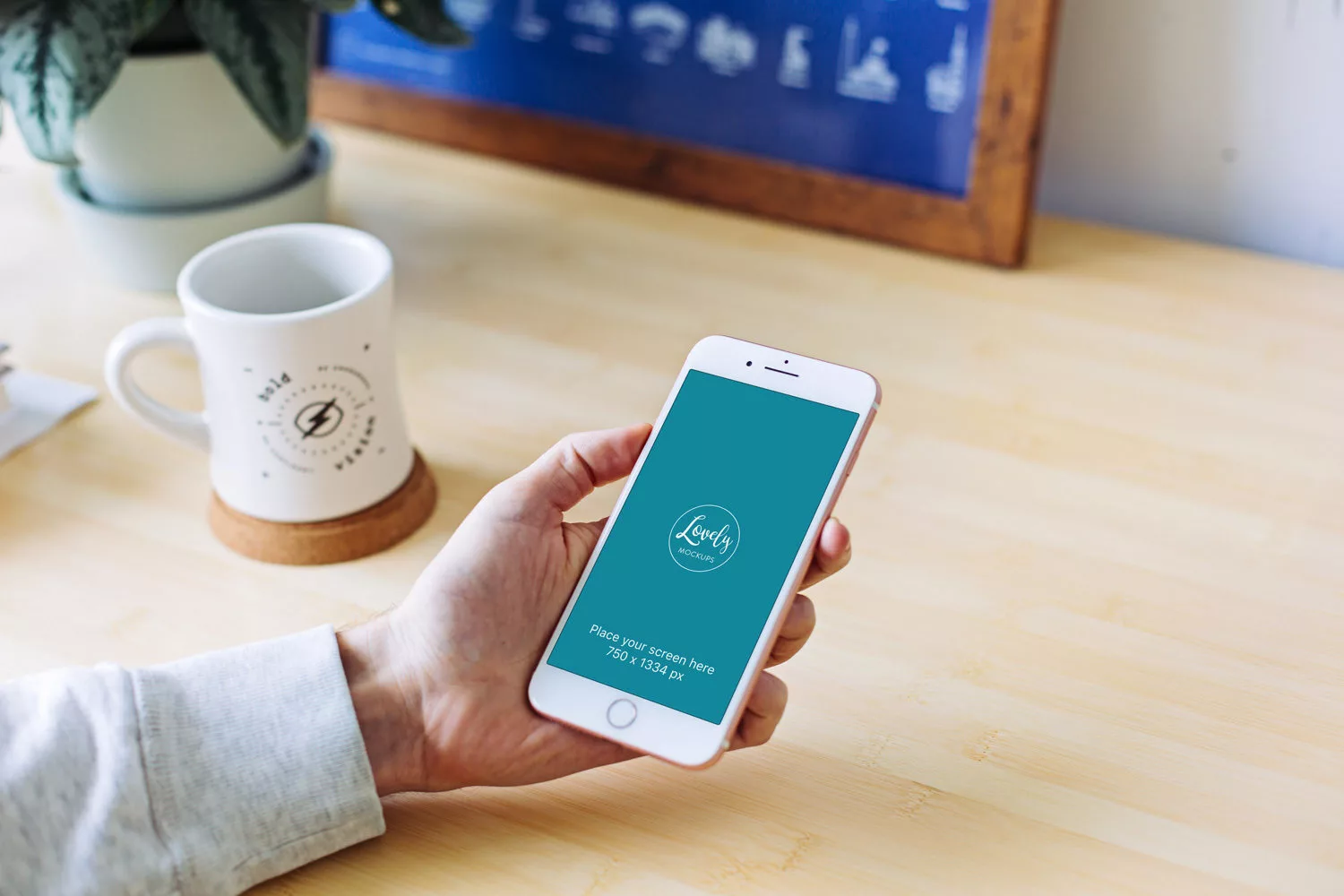 White iPhone in Man�s Hand Free Mockup