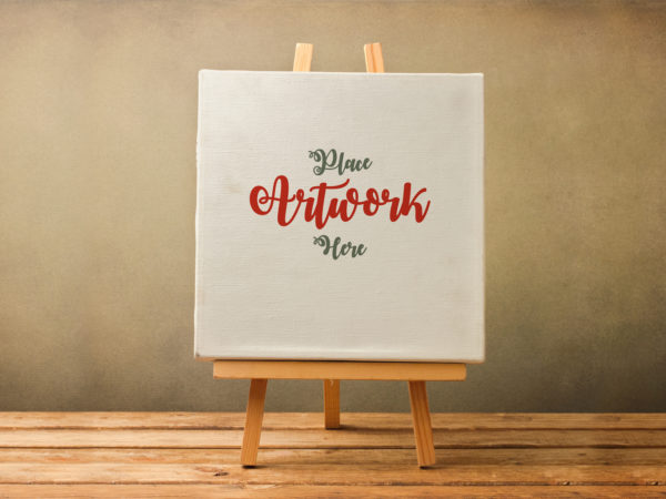 Free Canvas on Wooden Stand Mockup