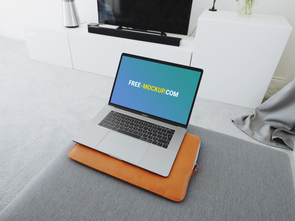 Free macbook pro in living room mockup 2018 | free mockup