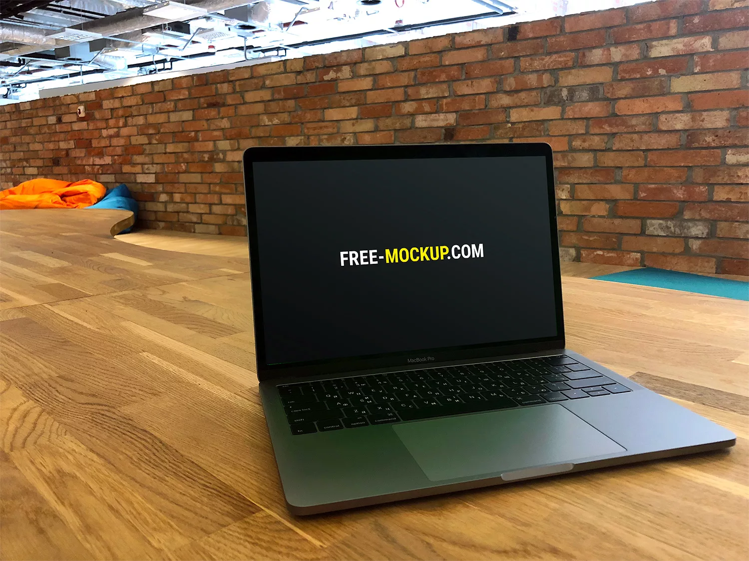 Free-MacBook-Pro-Mockups-in-Office-01