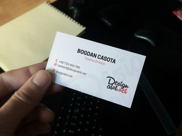 Business Card in Hand Mockup