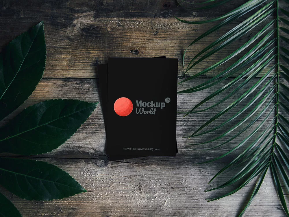 Free Greeting Card on Wooden Background Mockup