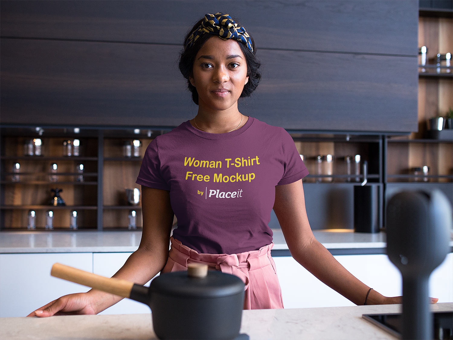 woman-wearing-a-round-neck-tshirt-mockup-while-in-her-kitchen-counter-a17128