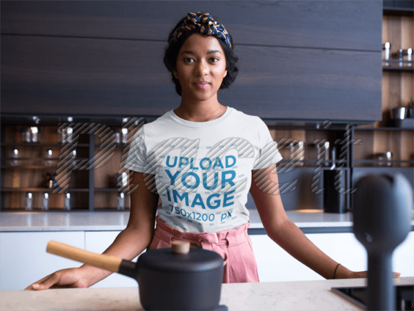 Woman Wearing T-Shirt in Kitchen Free Mockup by Placeit