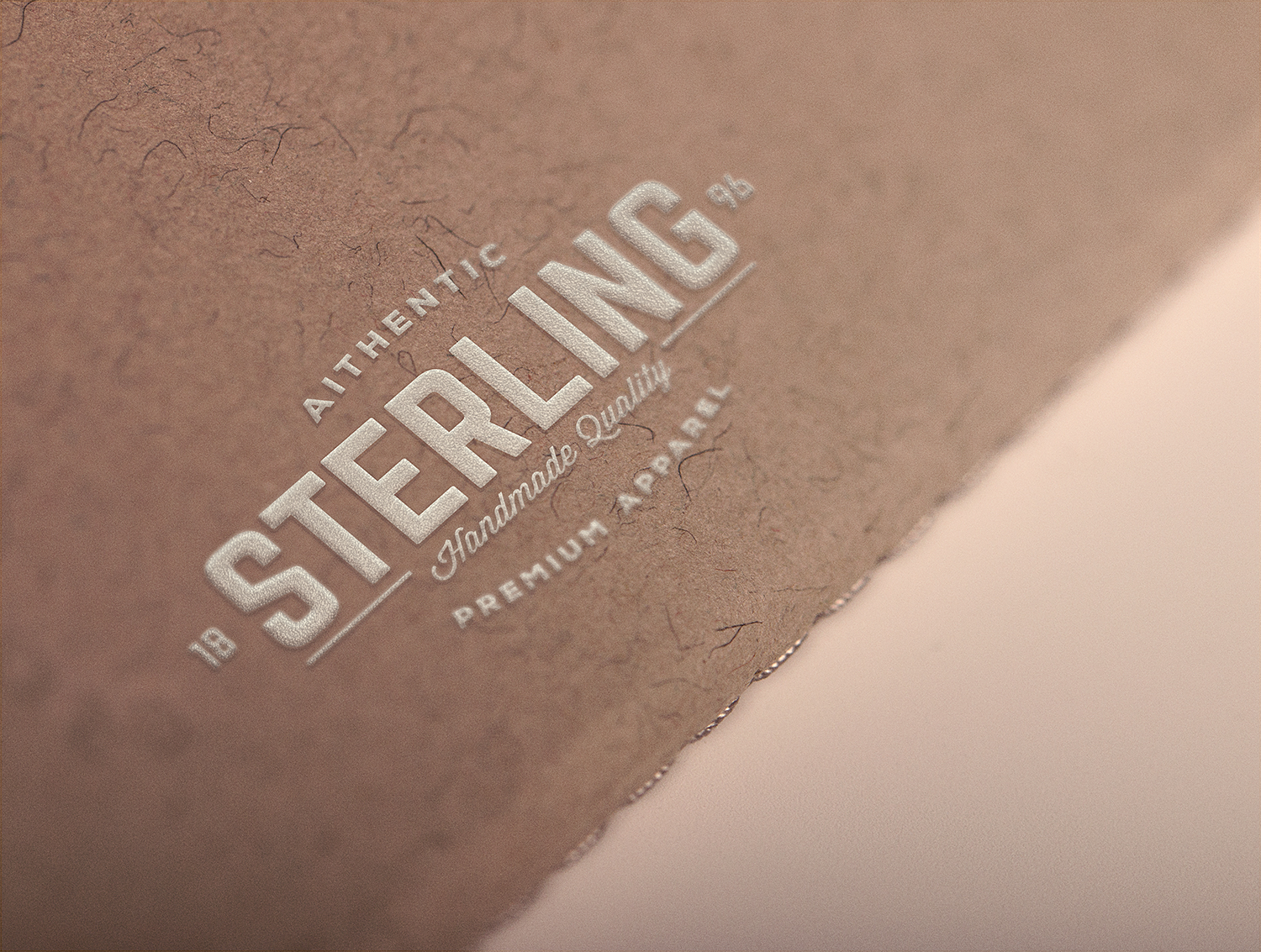 Download Embossed White Logo Mockup on Paper | Free Mockup