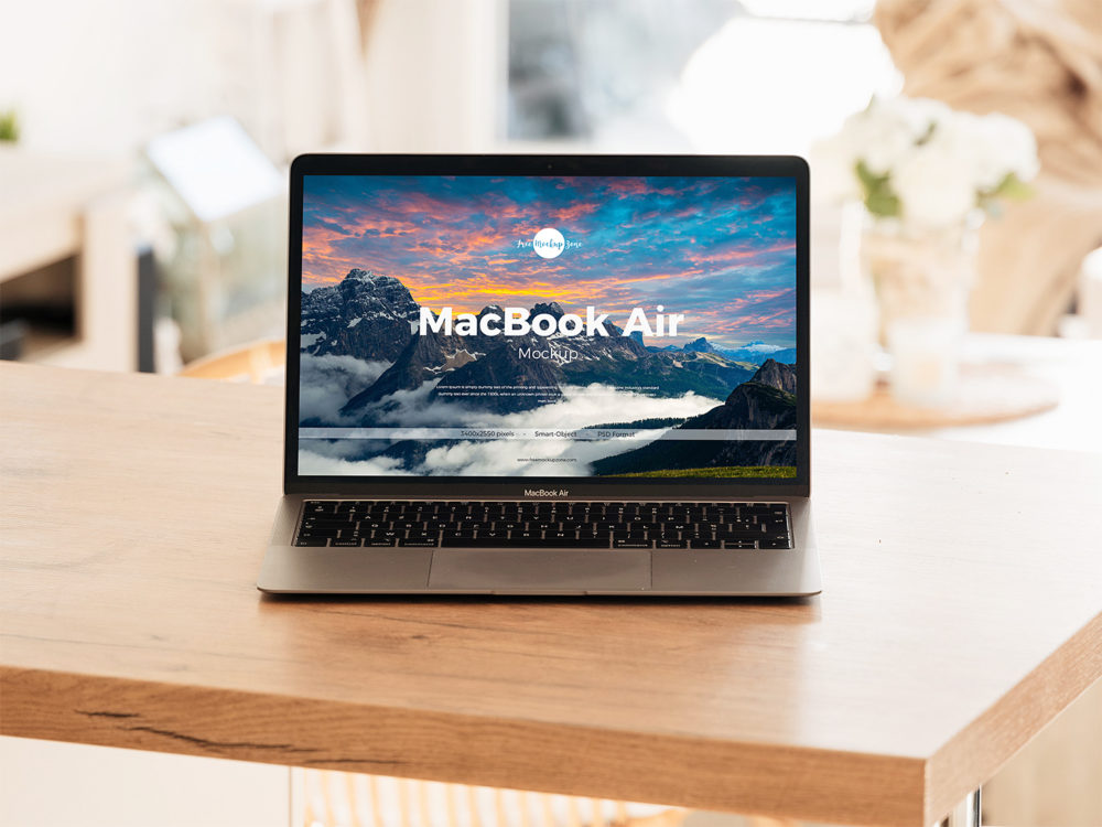 Free MacBook Air on a Table Mock-Up