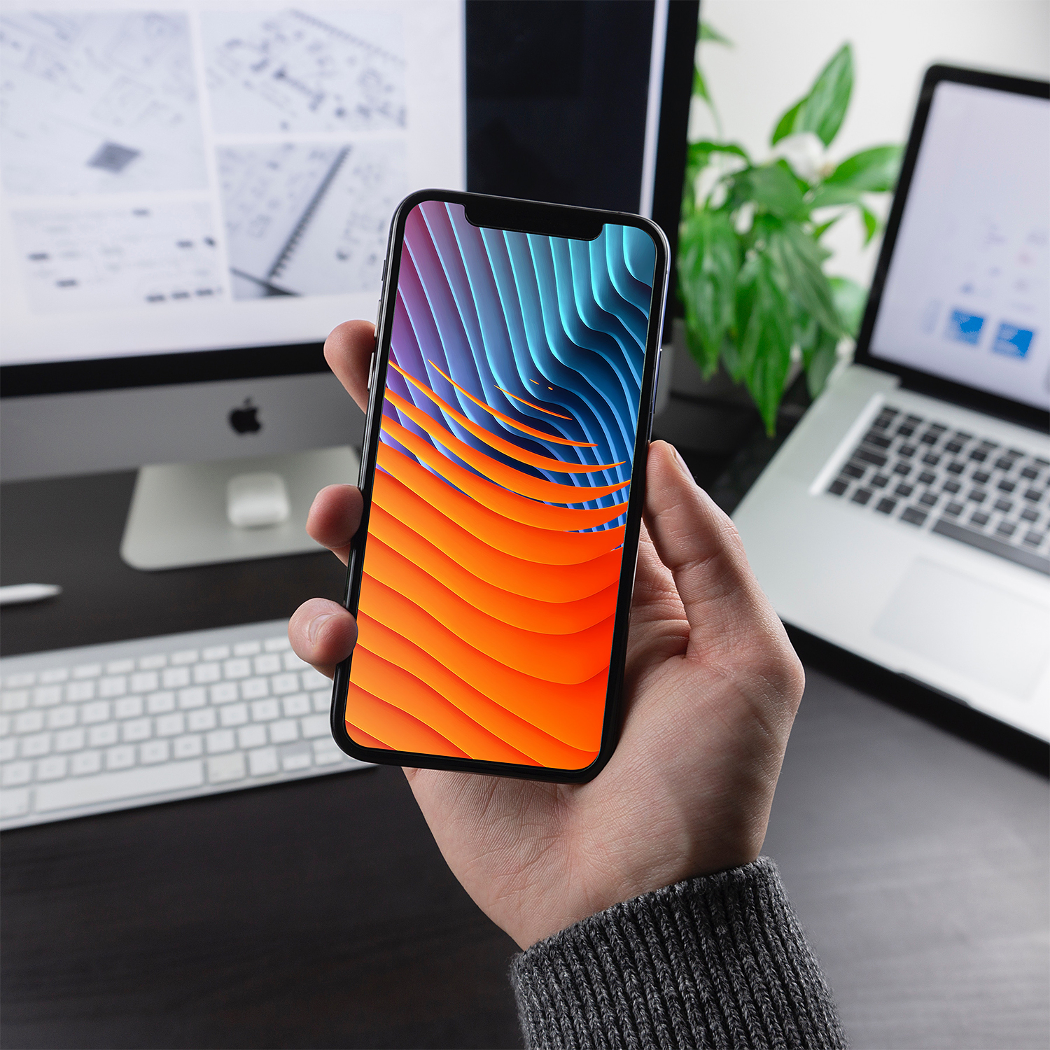 Download Man Holding iPhone X / XR / XS Mockup | Free Mockup