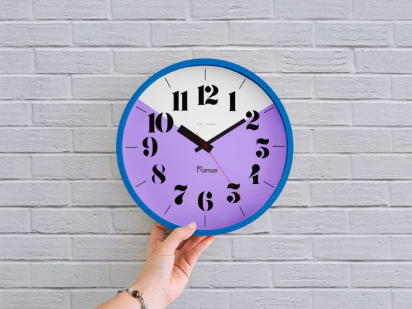 Free Wall Clock in Hand Mockup PSD