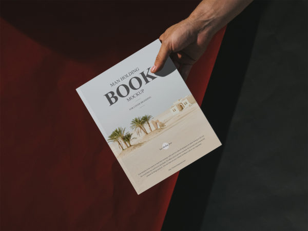 Man Holding Book Free Cover Mockup