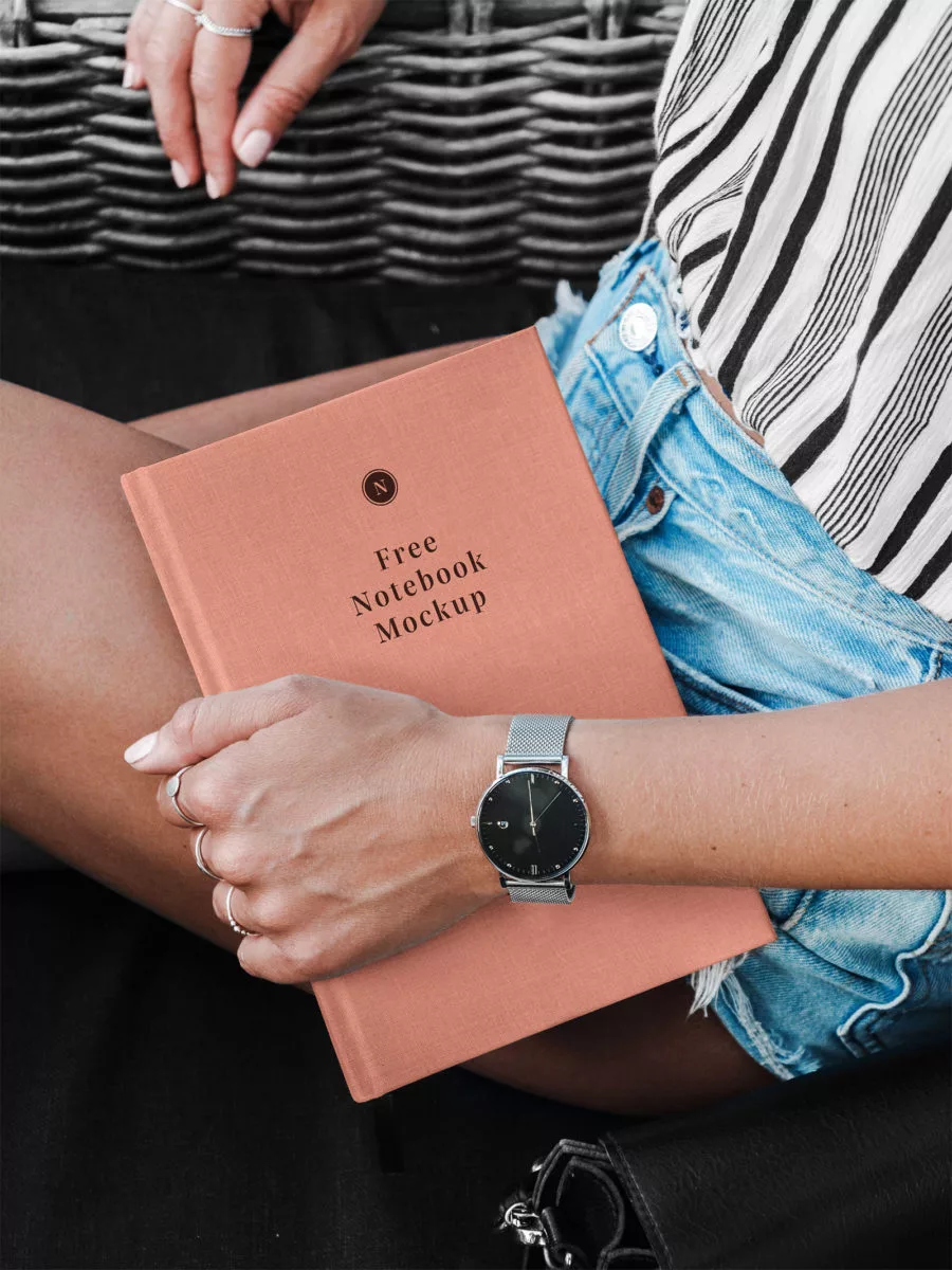 Hand Holding Hardcover Notebook/Catalog Mockup The Free Mockup