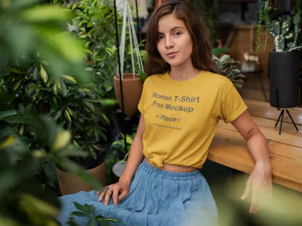 T-Shirt Mockup of a Woman Relaxing in Her Garden
