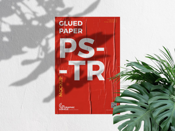 Free Glued Poster Mockup on a Concrete Wall