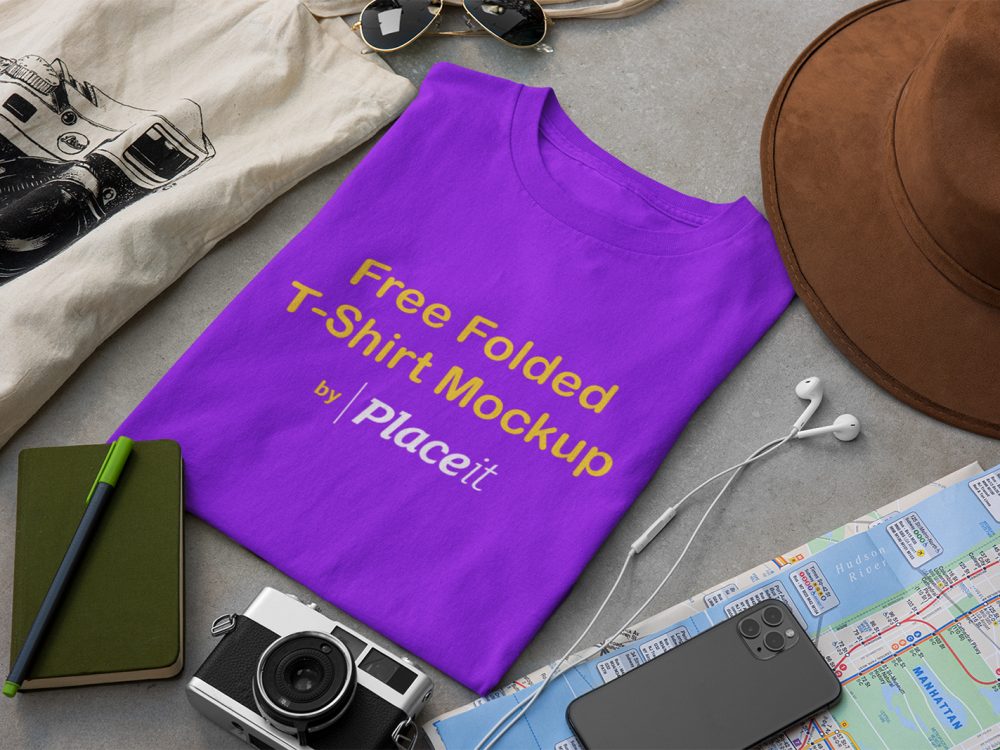 T shirt mockup surrounded by travel accessories | free mockup