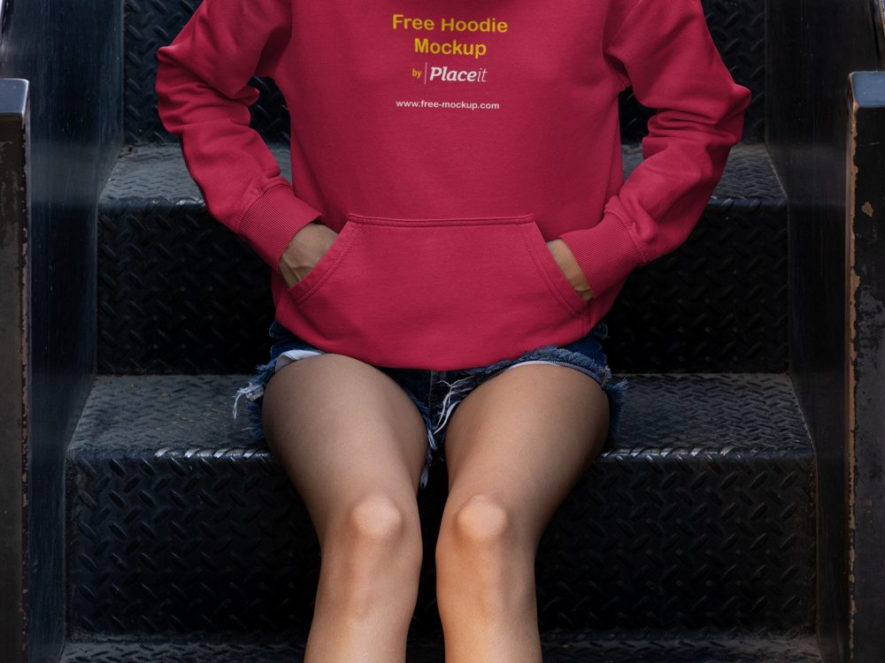 Hoodie Mockup of a Young Woman Sitting on Some Steps