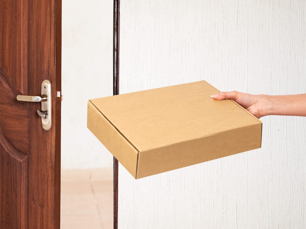 Mailing Box Free Mockup in Hand