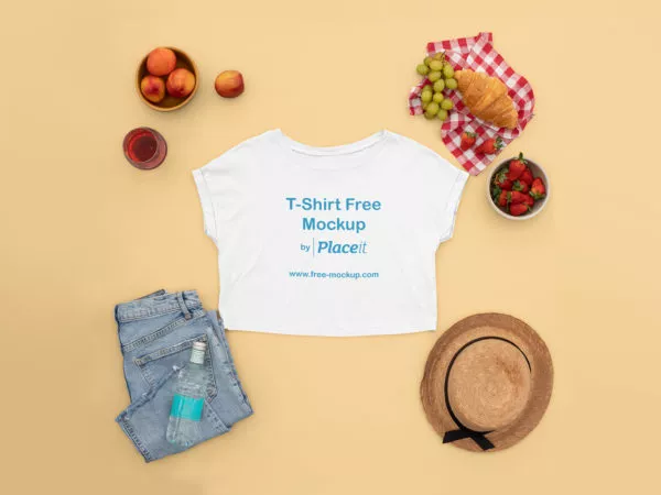 T-Shirt Crop Top Mockup Featuring a Woman’s Picnic Outfit