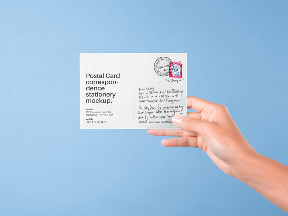 Hand Holding Postal Card Mockup