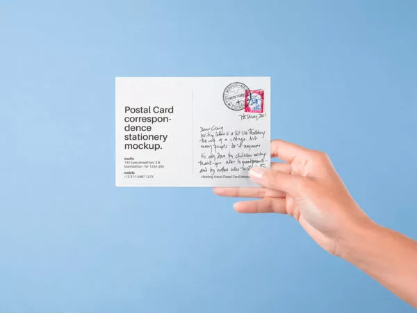 Hand Holding Postal Card Mockup
