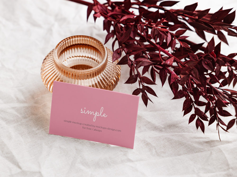 Free Business Card Mockup with a Red Plant