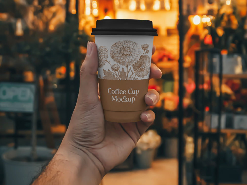Paper cup free psd mockup in hand | free mockup