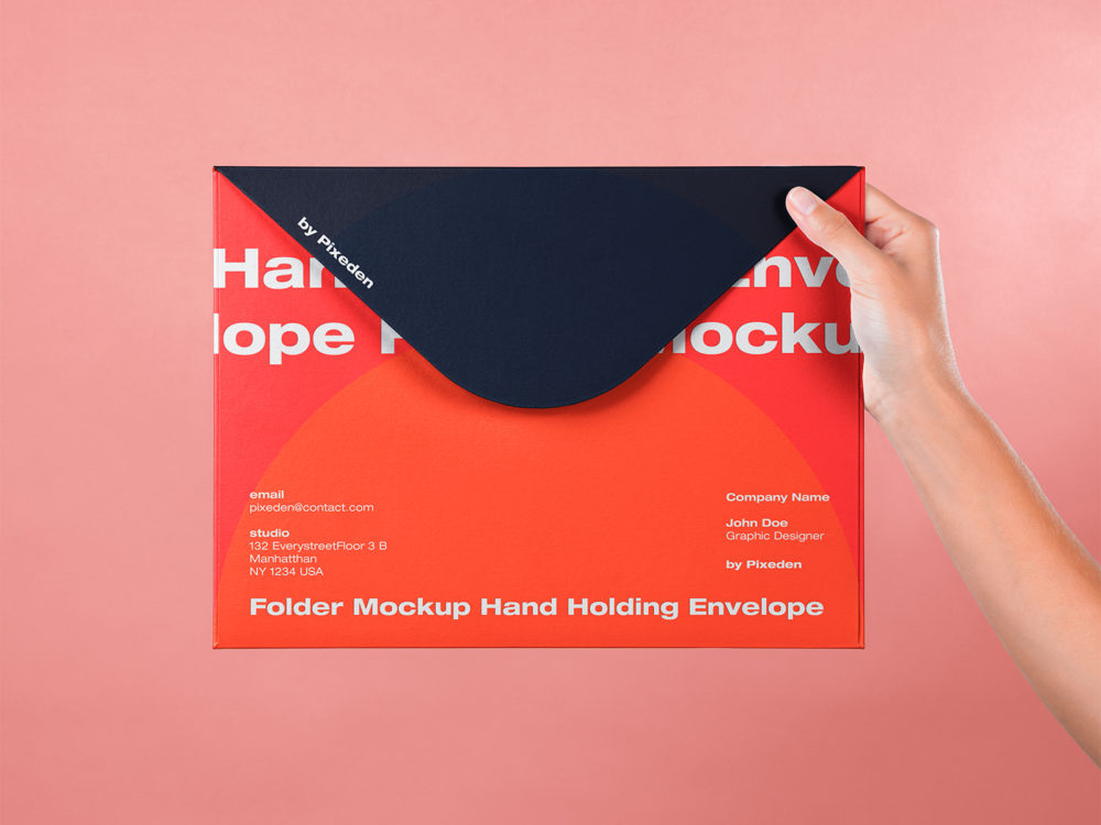 Hand holding large envelope free mockup | free mockup