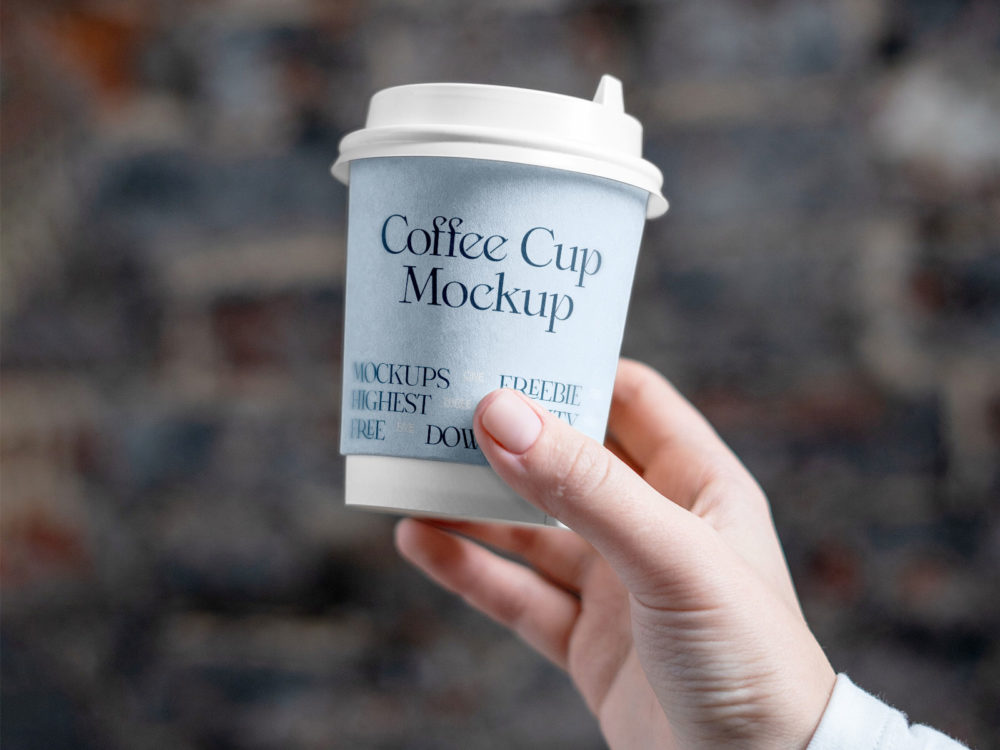 Coffee Cup in Hand Branding Mockup Free for Download