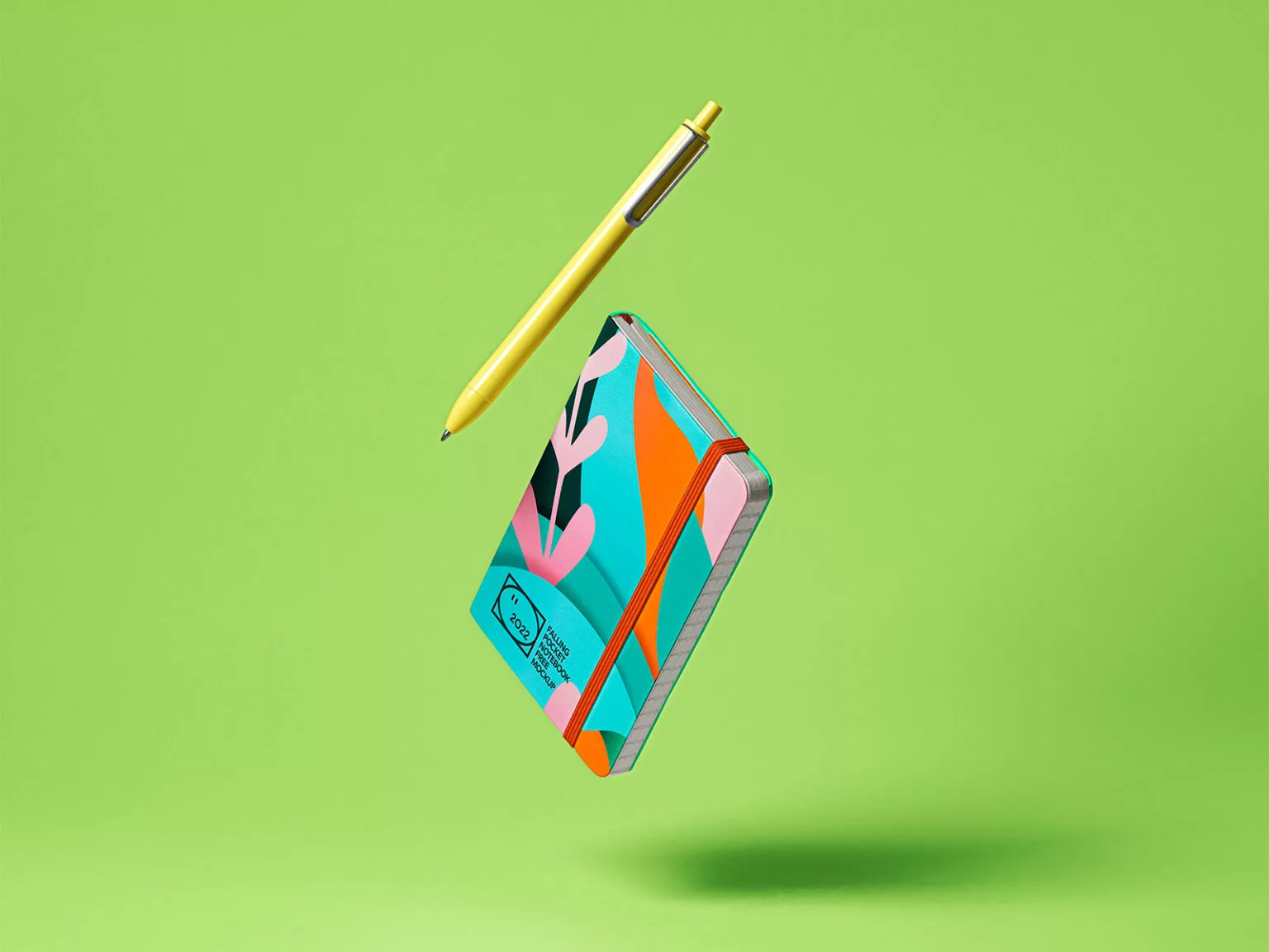 Free Floating Pocket Notebook Mockup with a Pen