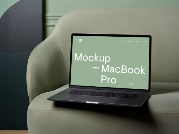 Free MacBook Pro on a Couch Mockup