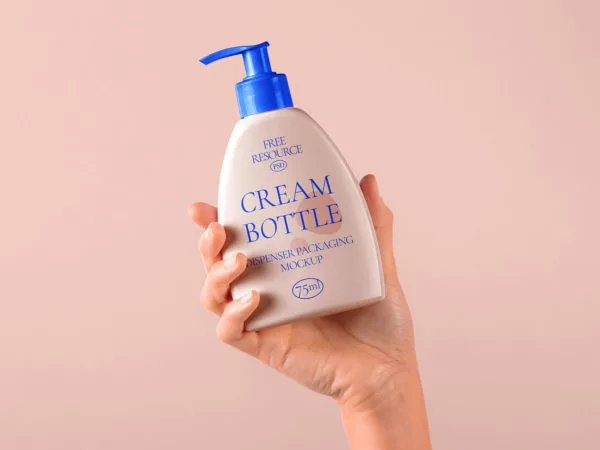 Hand Holding Cosmetic Pump Bottle Mockup PSD