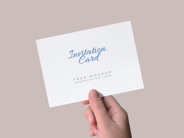 Hand Holding Invitation Card Free Mockup