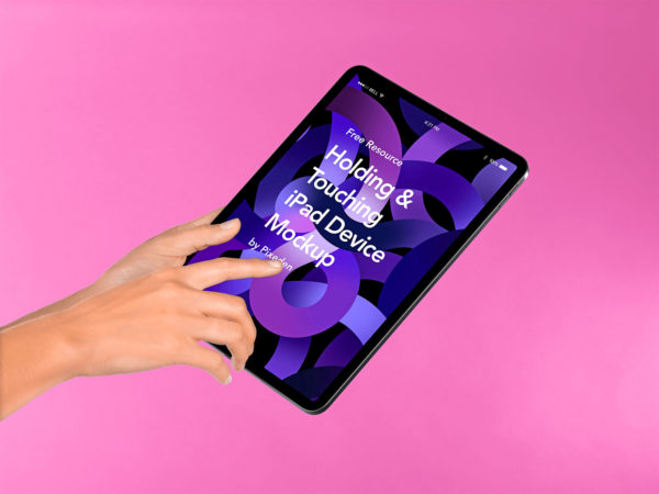 Hand Holding iPad Pro Free PSD Mockup