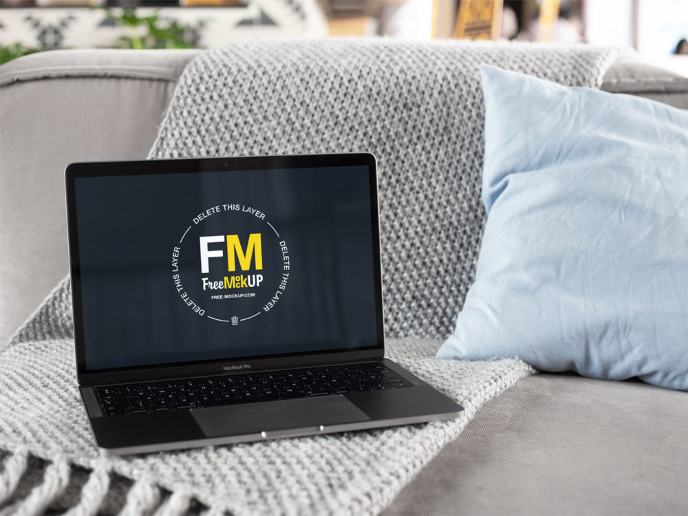 MacBook Free Mockup Featuring a House Environment