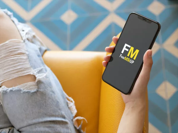 iPhone Mockup in a Girl’s Hand