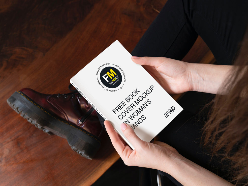 Free Book Cover Mockup in Woman's Hands