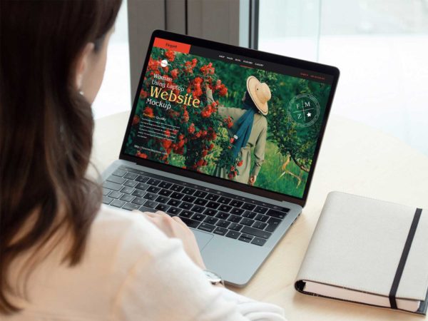 Woman Using Laptop Mockup: Unleash the Power of Seamless Design Integration!