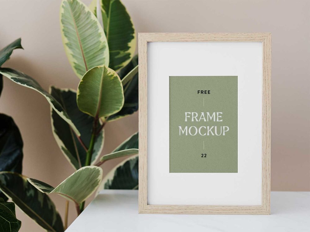 Wood Frame Mockup PSD with Plant: Elevate Your Art with Natural Elegance!