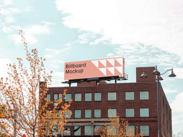 Free Billboard Mockup on a Building Roof