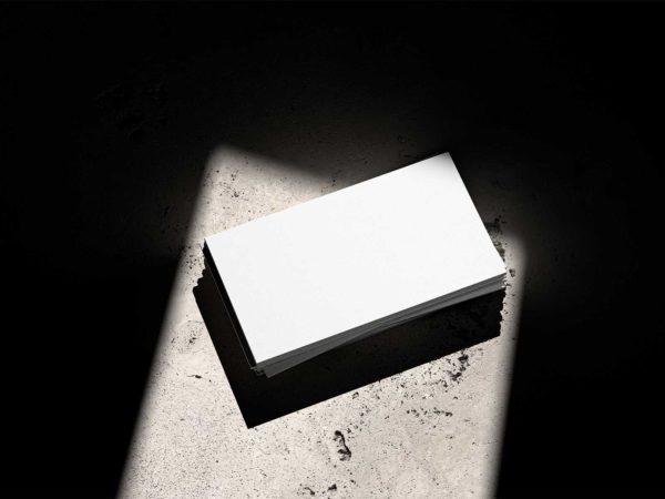 Free Business Card Mockup on Concrete Surface