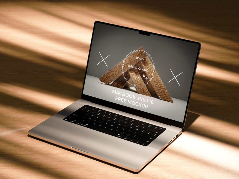 Free Website Laptop Mockup on a Wooden Surface